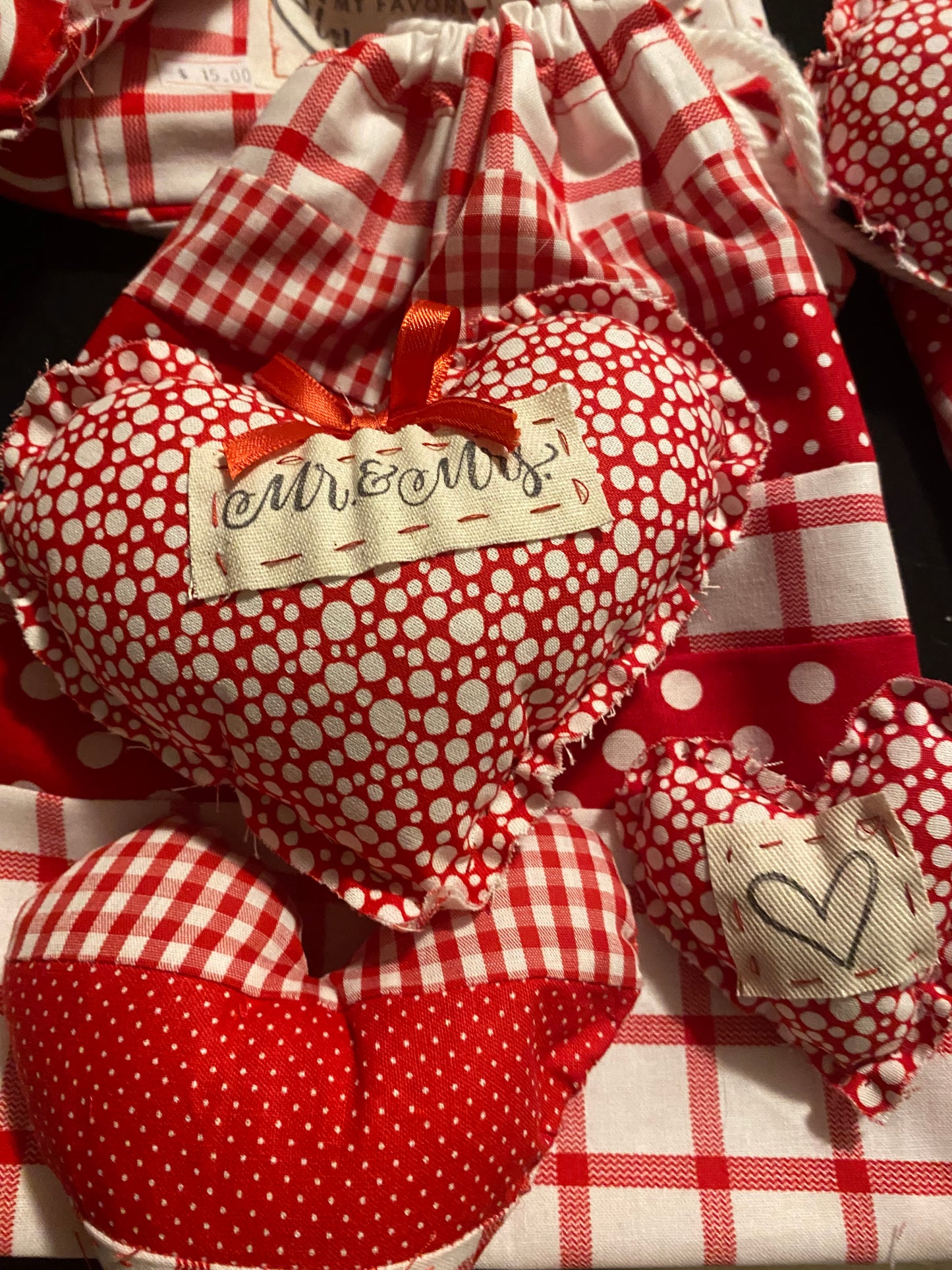 Handmade Fabric Bag with 3 matching fabric hearts.